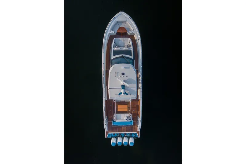 Slide: The Image of Aerial view of 2020 Ocean Alexander 45 Divergence Sport yacht on dark water. - 2