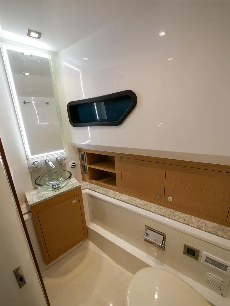 Slide: The Image of Luxurious bathroom in 2020 Ocean Alexander 45 Divergence Sport yacht, featuring modern fixtures and sleek design. - 28