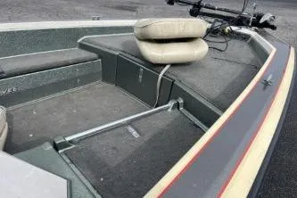 Slide: The Image of 1993 Bullet 20XD boat interior with seating and storage compartments. - 4