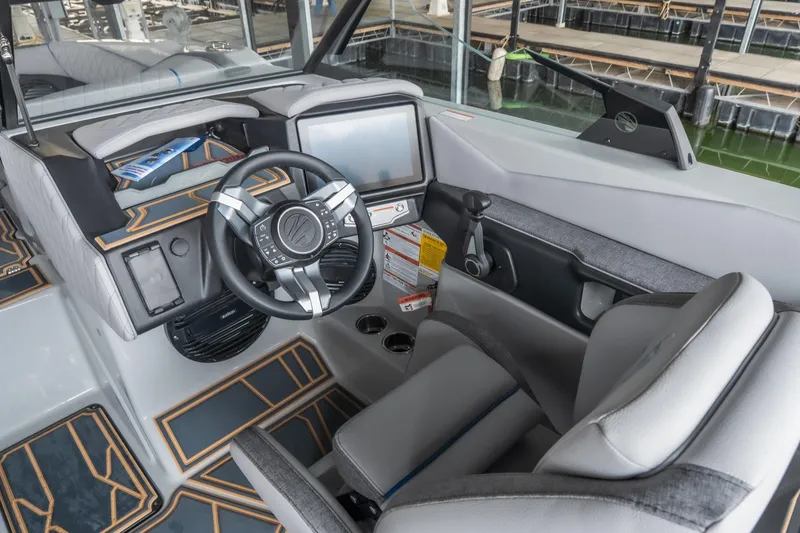 Slide: The Image of 2026 Tigé Z3 boat interior with modern dashboard and steering wheel design. - 12