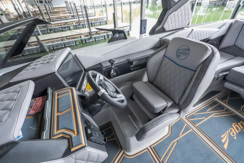 Slide: The Image of 2026 Tigé Z3 boat interior with modern steering and luxurious seating. - 16