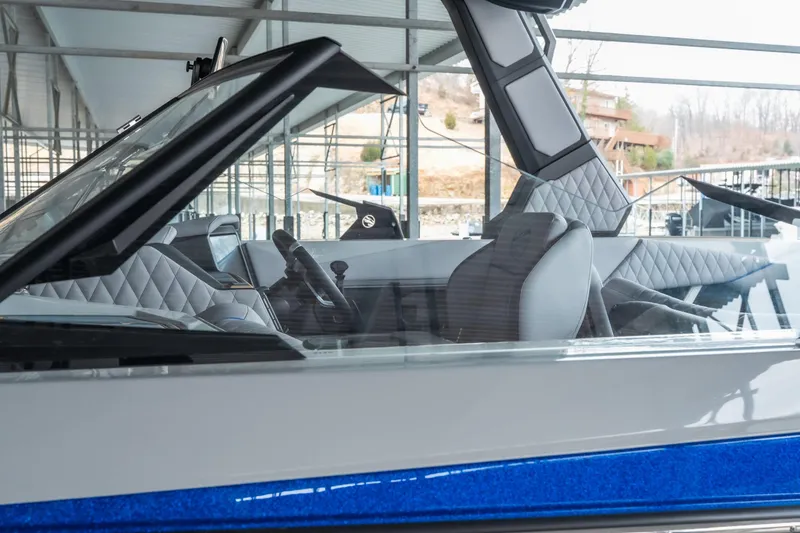 Slide: The Image of 2026 Tigé Z3 boat interior with modern design and quilted seating. - 32