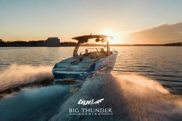 Slide: The Image of 2026 Tigé Z3 boat cruising on a lake at sunset, Big Thunder Marine logo visible. - 35