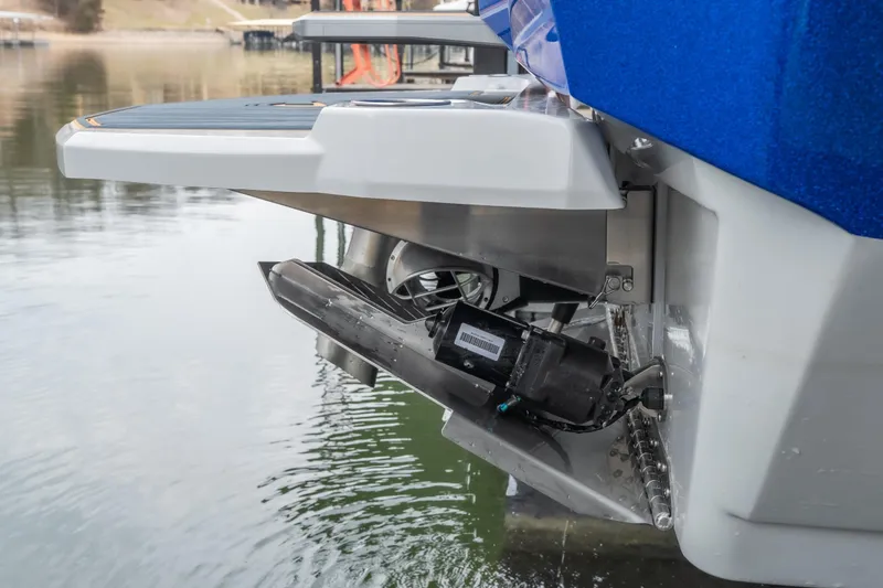 Slide: The Image of 2026 Tigé Z3 boat with advanced wakeboarding technology on a calm lake. - 5