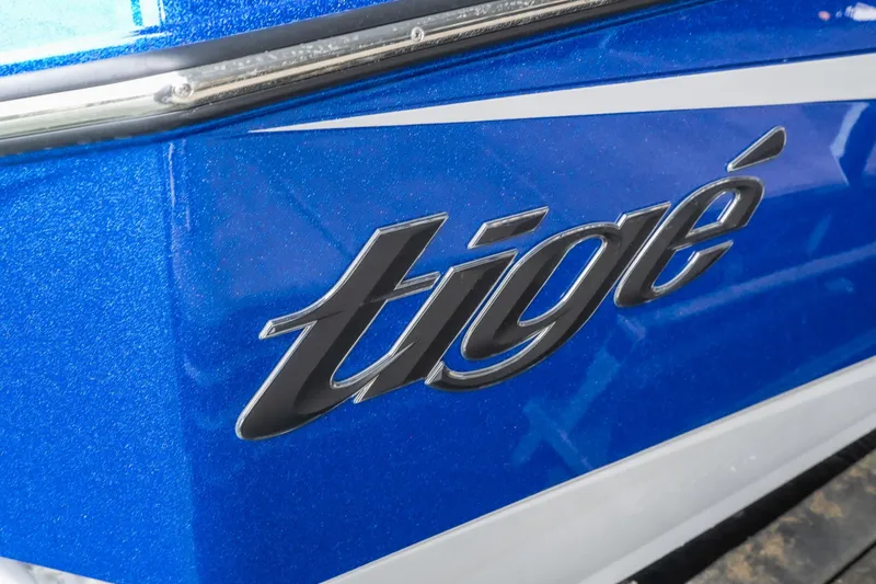 Slide: The Image of Close-up of 2026 Tigé Z3 boat logo on blue exterior. - 6