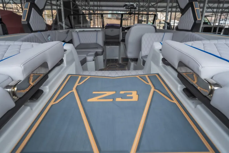 Slide: The Image of 2026 Tigé Z3 boat interior with luxurious seating and modern design. - 9
