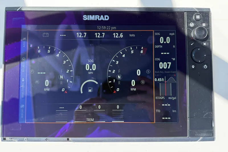 Slide: The Image of Simrad display on 2023 Invincible 46 Catamaran showing navigation and engine data. - 19