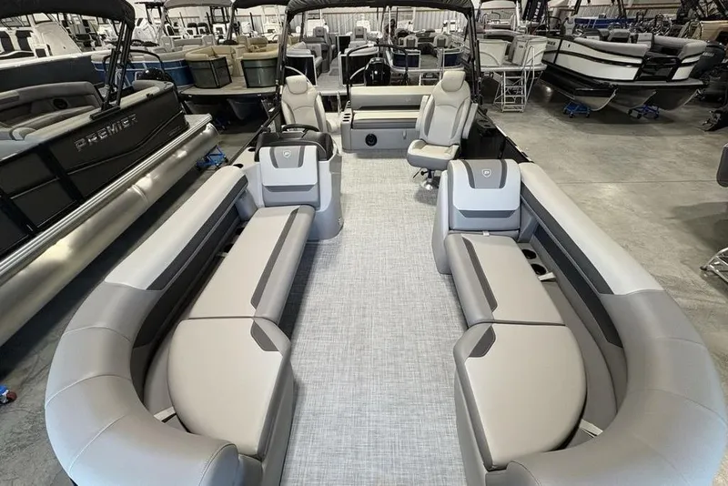 Slide: The Image of 2026 Premier 220 Sunscape RL - CL pontoon boat interior with spacious seating and modern design. - 23