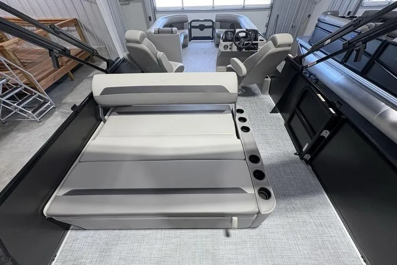 Slide: The Image of 2026 Premier 220 Sunscape RL - CL pontoon boat interior with seating and helm. - 25