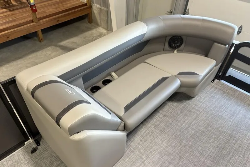 Slide: The Image of 2026 Premier 220 Sunscape RL - CL boat interior with luxurious seating and cup holders. - 5