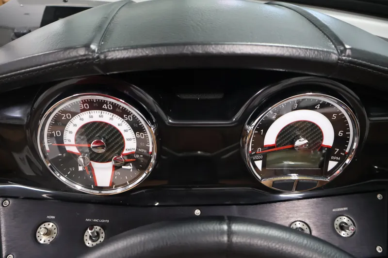 Slide: The Image of Dashboard of 2026 Four Winns HD2 OB boat with speedometer and tachometer. - 23