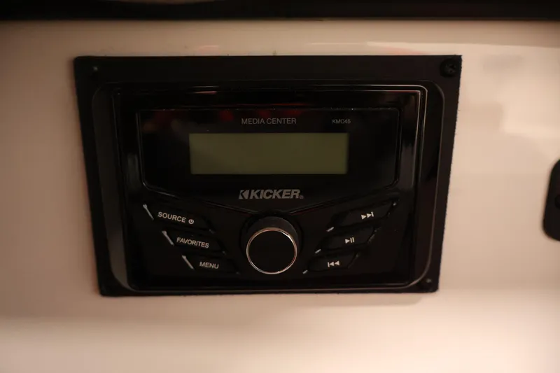 Slide: The Image of Kicker media center in 2026 Four Winns HD2 OB boat dashboard. - 30