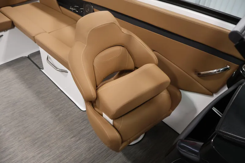 Slide: The Image of 2026 Four Winns HD2 OB boat interior with tan leather seating and modern design. - 33
