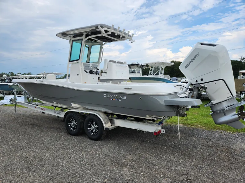 Slide: The Image of 2024 Caymas 28 HB boat on trailer, side view. - 14