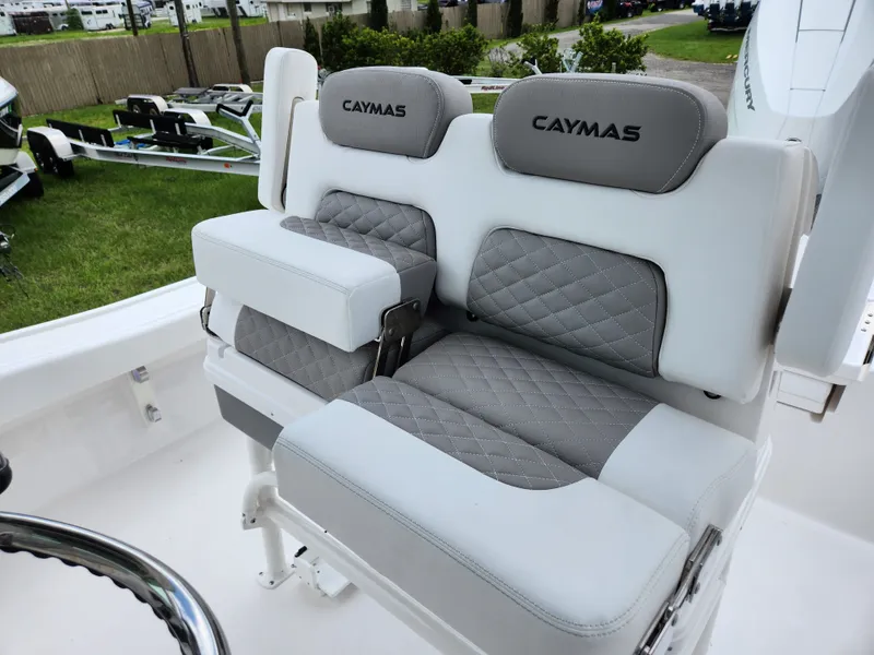 Slide: The Image of 2024 Caymas 28 HB boat seats with gray upholstery design. - 9
