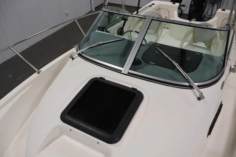 Slide: The Image of 2004 Trophy 2002 Walkaround boat with windshield and open hatch. - 14