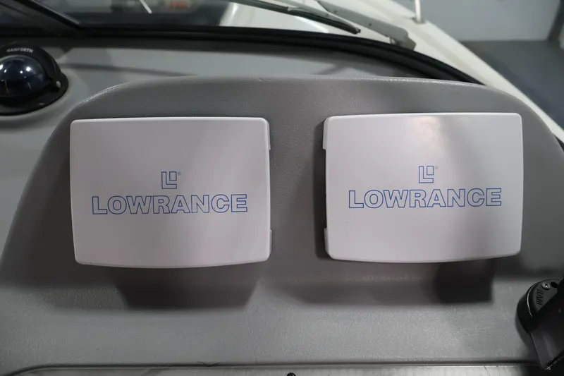 Slide: The Image of Lowrance equipment on 2004 Trophy 2002 Walkaround boat dashboard. - 21