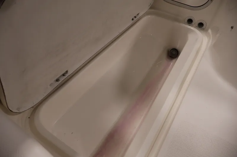 Slide: The Image of 2004 Trophy 2002 Walkaround boat storage compartment interior view. - 41