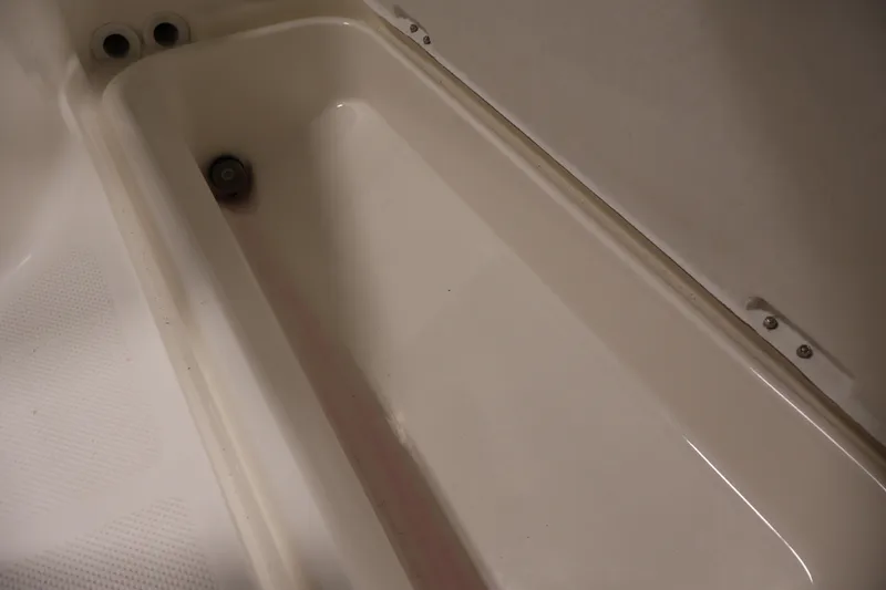 Slide: The Image of Interior view of a 2004 Trophy 2002 Walkaround boat compartment. - 44