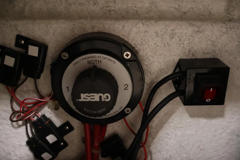 Slide: The Image of Boat battery switch and wiring in a 2004 Trophy 2002 Walkaround. - 46