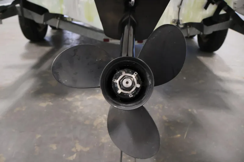 Slide: The Image of Propeller of a 2004 Trophy 2002 Walkaround boat on a trailer. - 50