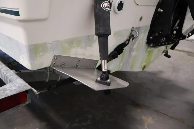 Slide: The Image of 2004 Trophy 2002 Walkaround boat with trim tab and motor mount detail. - 54