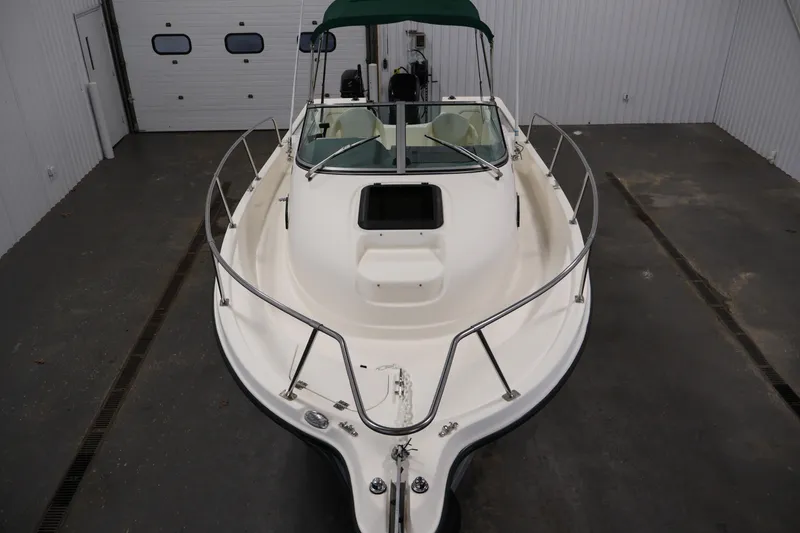 Slide: The Image of 2004 Trophy 2002 Walkaround boat in indoor storage, front view. - 8