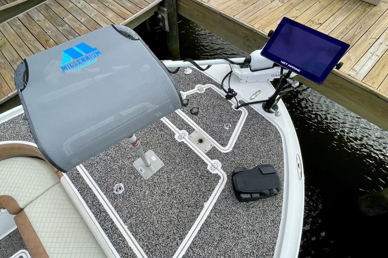 Slide: The Image of 2021 Caymas 26 HB boat deck with Millennium Marine seat and Garmin electronics. - 11