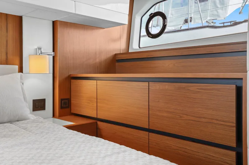 Slide: The Image of Luxurious interior of 2023 Tiara Yachts C49 Coupe with elegant wood finish and modern design. - 51