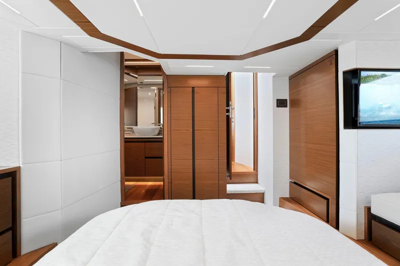 Slide: The Image of Luxurious interior of 2023 Tiara Yachts C49 Coupe, featuring modern design and elegant wood finishes. - 56
