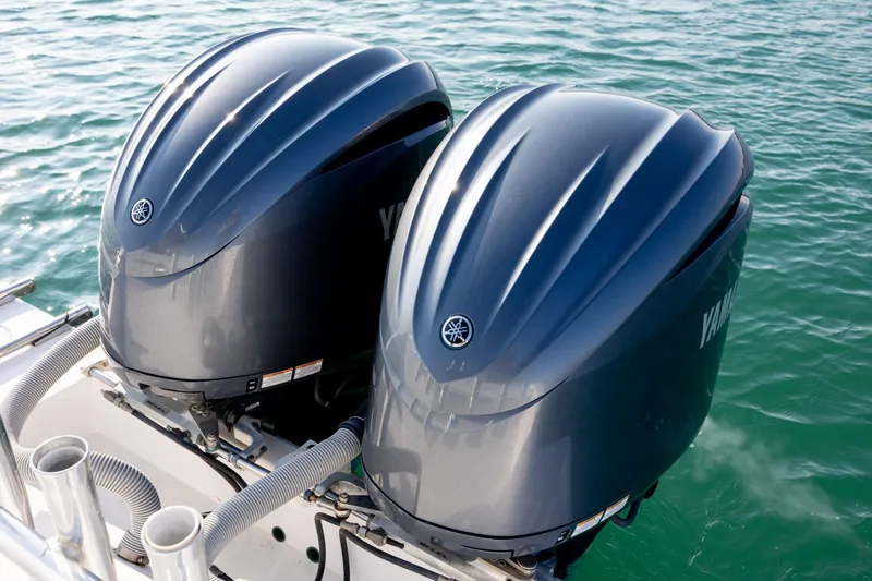 Slide: The Image of Twin Yamaha outboard engines on a 2013 Contender 32 Tournament boat. - 32