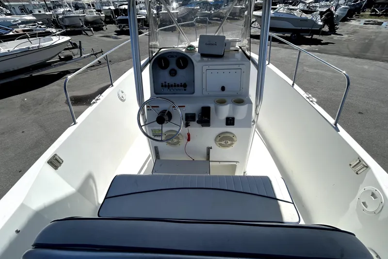 Slide: The Image of 2004 Hydra-Sports Lightning 230 CC boat rear view with outboard motor and ladder. - 10