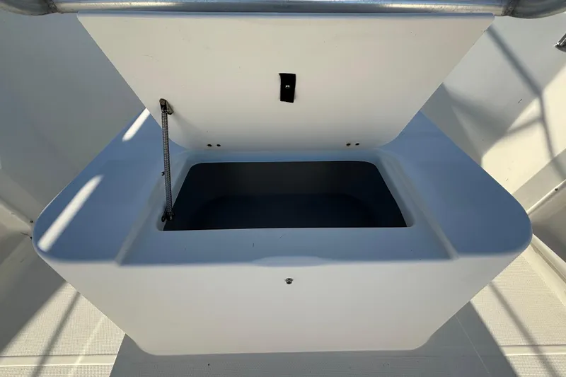 Slide: The Image of Open storage compartment on 2004 Hydra-Sports Lightning 230 CC boat. - 20