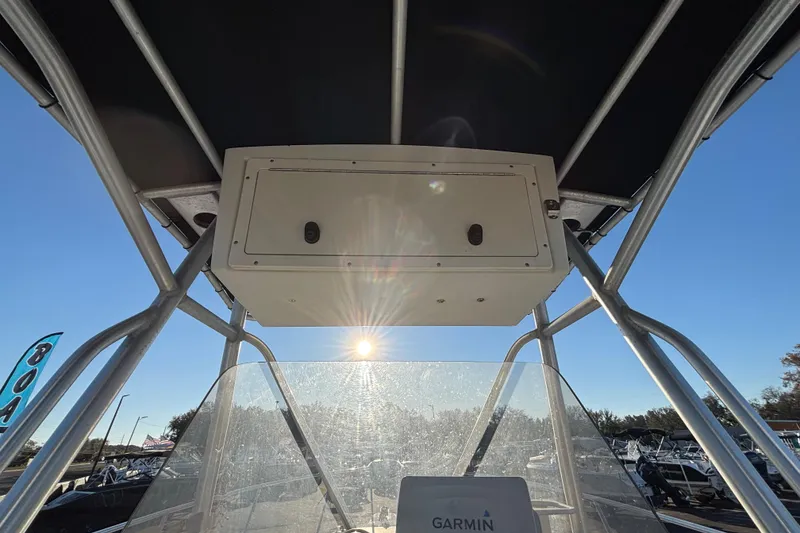 Slide: The Image of 2004 Hydra-Sports Lightning 230 CC boat console with T-top and Garmin equipment. - 22