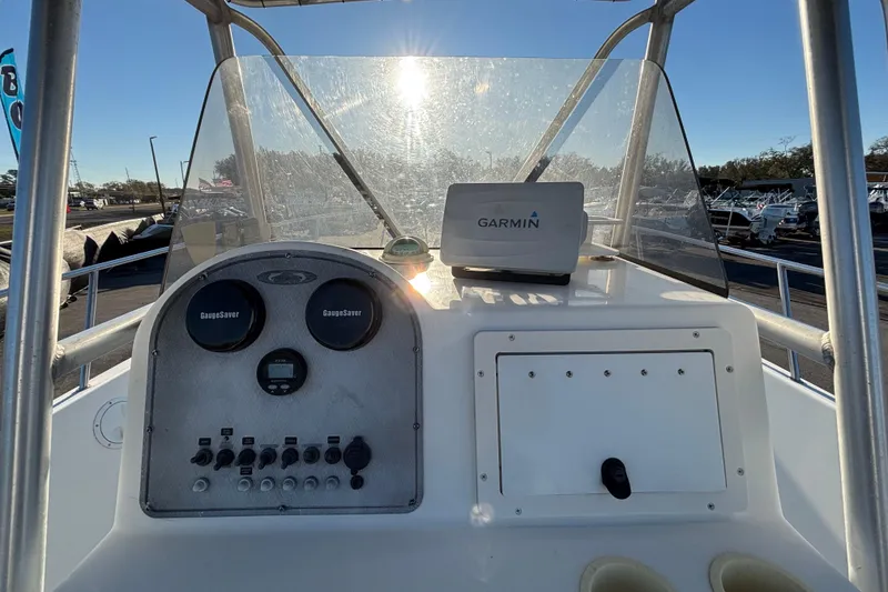 Slide: The Image of 2004 Hydra-Sports Lightning 230 CC boat console with Garmin navigation system. - 23