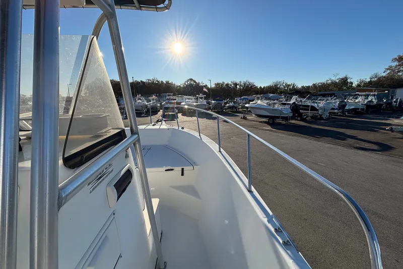 Slide: The Image of 2004 Hydra-Sports Lightning 230 CC boat in marina, sunny day, clear sky. - 31