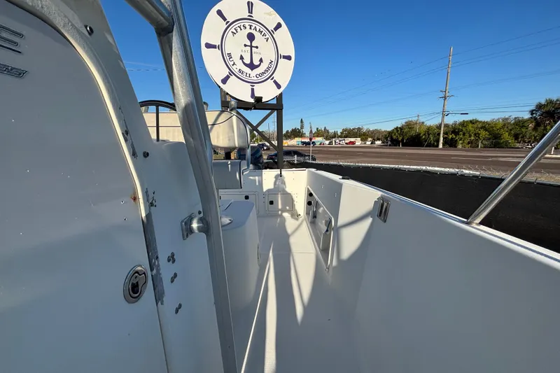 Slide: The Image of 2004 Hydra-Sports Lightning 230 CC boat interior with clear blue sky background. - 60