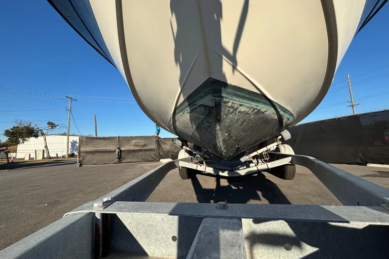 Slide: The Image of 2004 Hydra-Sports Lightning 230 CC boat on trailer, viewed from below, outdoors. - 66