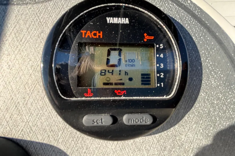 Slide: The Image of 2004 Hydra-Sports Lightning 230 CC with Yamaha V6 200 outboard motor. - 74