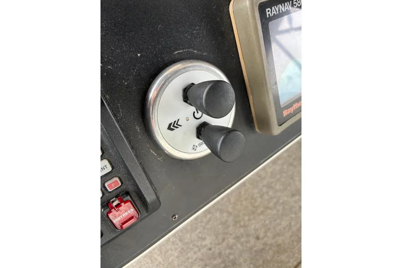 Slide: The Image of Control panel of a 1994 Carver 370 Aft Cabin Motor Yacht with navigation equipment. - 22