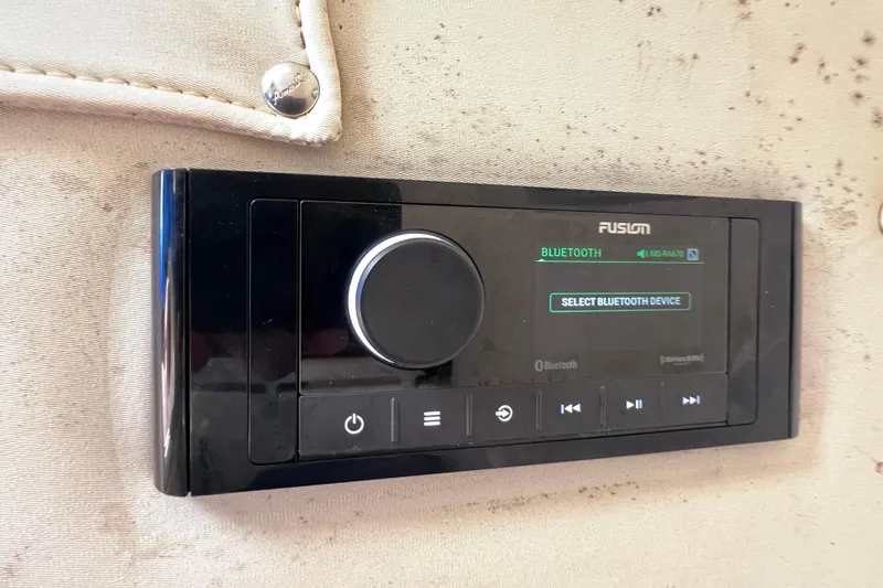 Slide: The Image of Fusion Bluetooth stereo system on a 2003 Century 2600 Center Console boat. - 35