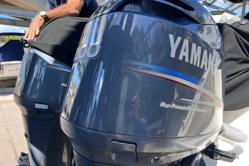 Slide: The Image of Yamaha outboard motors on a 2003 Century 2600 Center Console boat. - 48