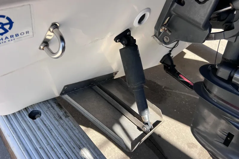 Slide: The Image of 2003 Century 2600 Center Console boat transom with hydraulic trim tab and motor mount. - 50