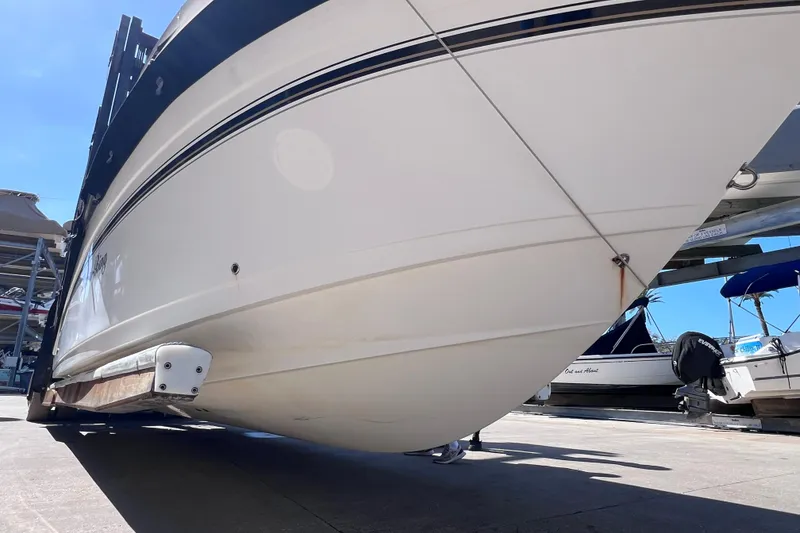 Slide: The Image of 2003 Century 2600 Center Console boat on trailer, viewed from below. - 7