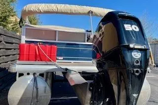 Slide: The Image of 2023 Sun Tracker Bass Buggy 16 XL Select pontoon boat with 50 HP engine. - 13