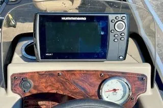 Slide: The Image of 2023 Sun Tracker Bass Buggy 16 XL Select dashboard with Humminbird Helix 7 fish finder. - 4
