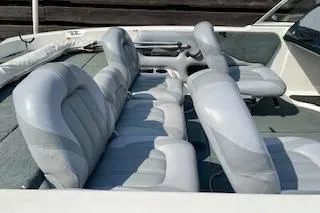 Slide: The Image of 2008 Stratos 476 Ski-N-Fish boat interior with gray seating and steering console. - 4