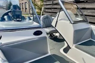 Slide: The Image of 2008 Stratos 476 Ski-N-Fish boat interior with seating and windshield. - 5