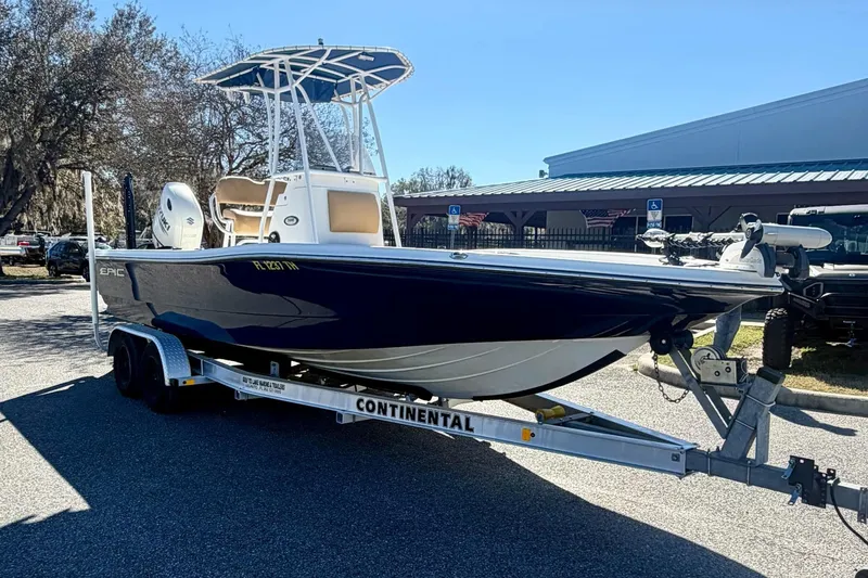 Slide: The Image of 2018 Epic 24 Bay Center Console boat on trailer, parked outdoors. - 3