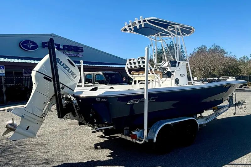 Slide: The Image of 2018 Epic 24 Bay Center Console boat with Suzuki outboard motor on trailer. - 5